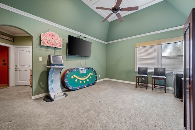 interior space featuring crown molding, high vaulted ceiling, and ceiling fan