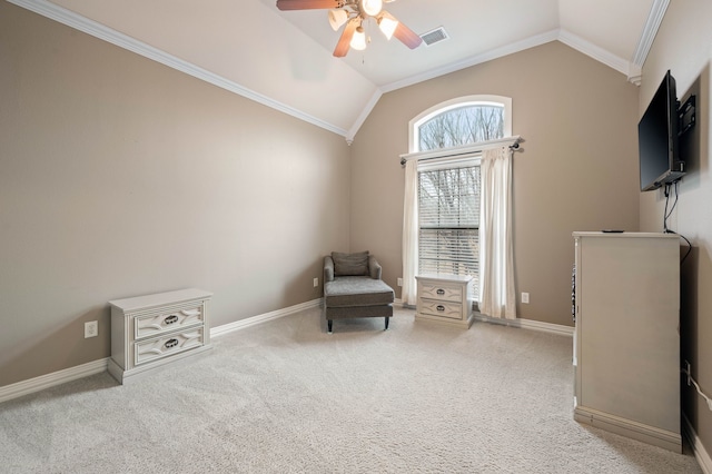 living area with crown molding, lofted ceiling, light colored carpet, and ceiling fan