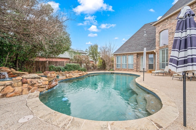 view of pool featuring a patio area