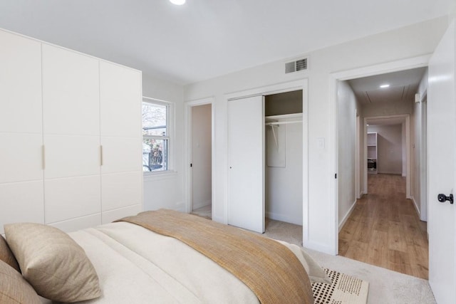 bedroom featuring light hardwood / wood-style floors