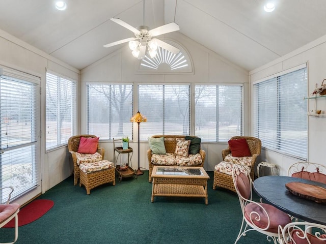 sunroom featuring vaulted ceiling and ceiling fan