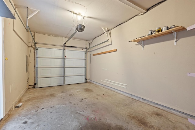 garage featuring a garage door opener and electric panel