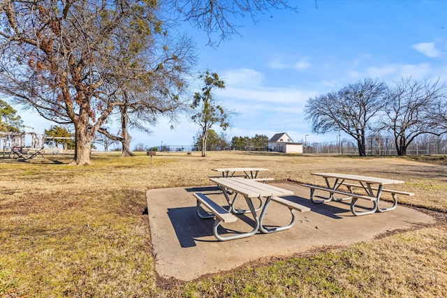 view of home's community with a lawn