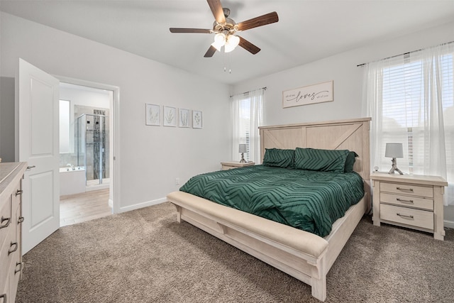 carpeted bedroom with connected bathroom and ceiling fan