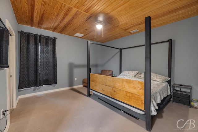 bedroom featuring wood ceiling, concrete floors, and ceiling fan