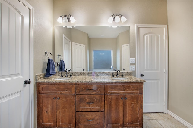 bathroom featuring vanity and tile patterned flooring