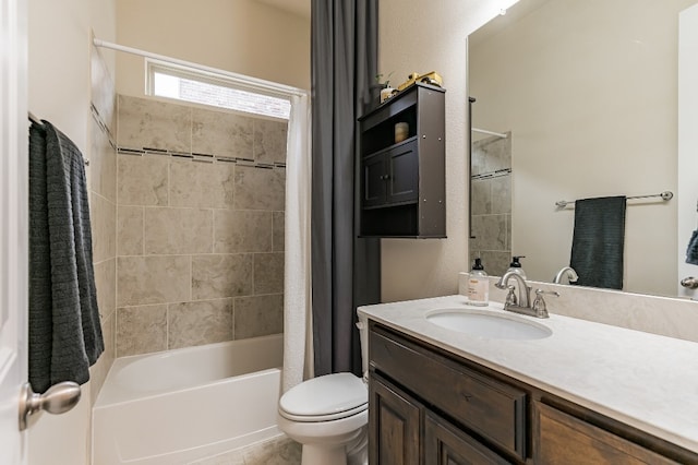 full bathroom featuring vanity, shower / tub combo, and toilet