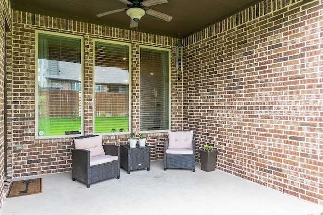 view of patio / terrace featuring ceiling fan