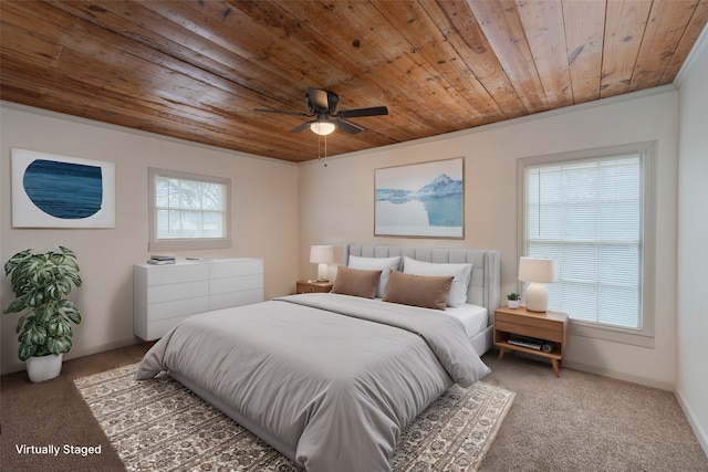 carpeted bedroom with ornamental molding and wooden ceiling