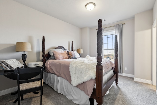 bedroom featuring carpet