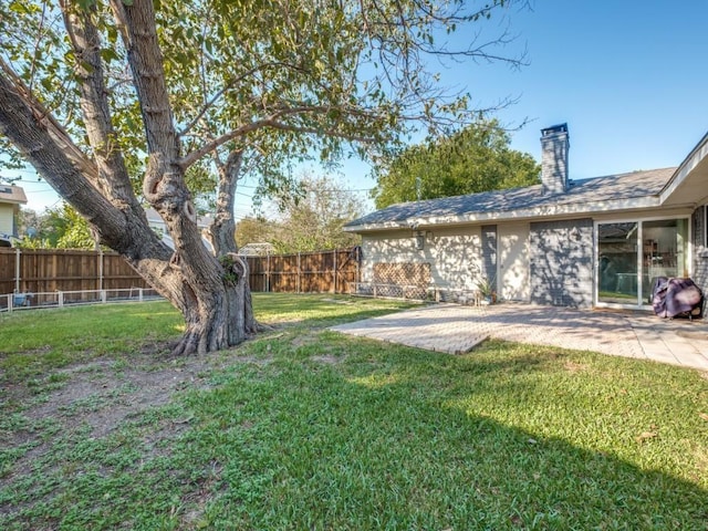 view of yard with a patio area