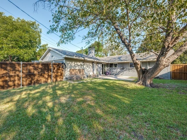 exterior space featuring a yard