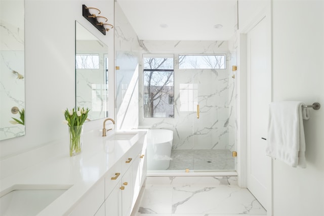 bathroom with vanity and a shower with door