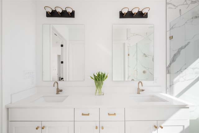 bathroom with vanity and an enclosed shower