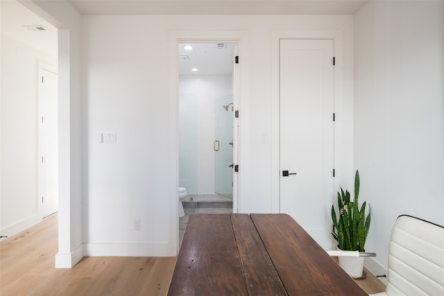 hallway featuring light hardwood / wood-style floors