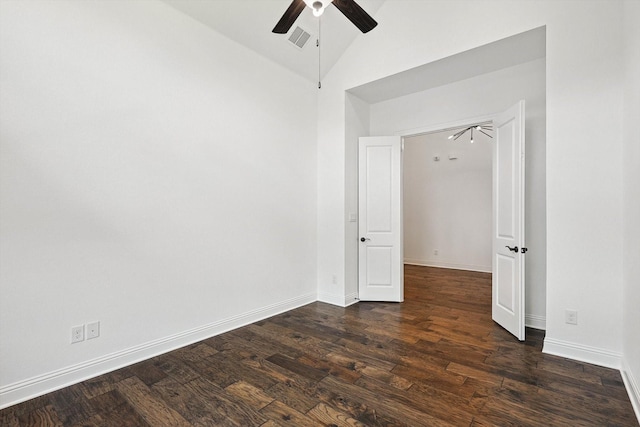 unfurnished bedroom with vaulted ceiling, dark hardwood / wood-style floors, and ceiling fan