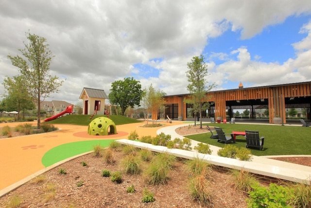 view of home's community featuring a playground