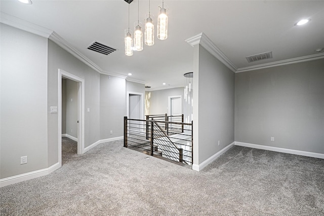 unfurnished room featuring ornamental molding, carpet flooring, and a chandelier