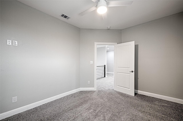 unfurnished bedroom with ceiling fan and carpet flooring