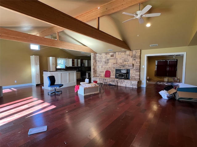 living room featuring dark hardwood / wood-style flooring, beam ceiling, high vaulted ceiling, and ceiling fan