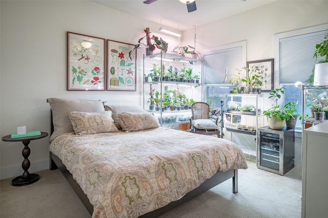 bedroom featuring carpet floors and beverage cooler