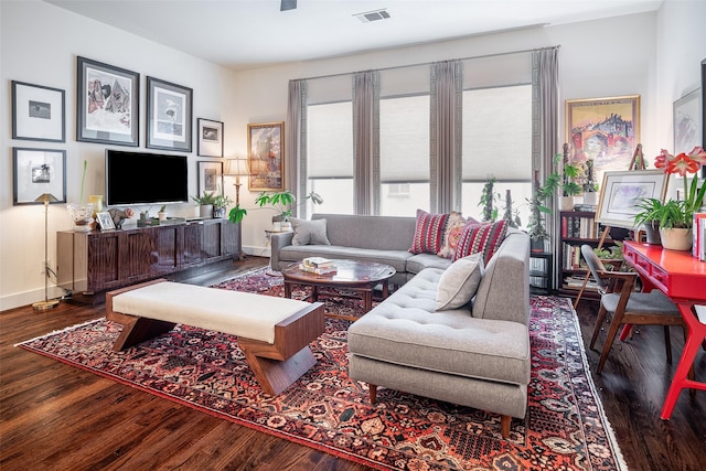 living room featuring dark hardwood / wood-style flooring