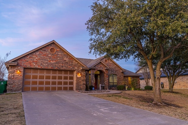 view of front of home with a garage