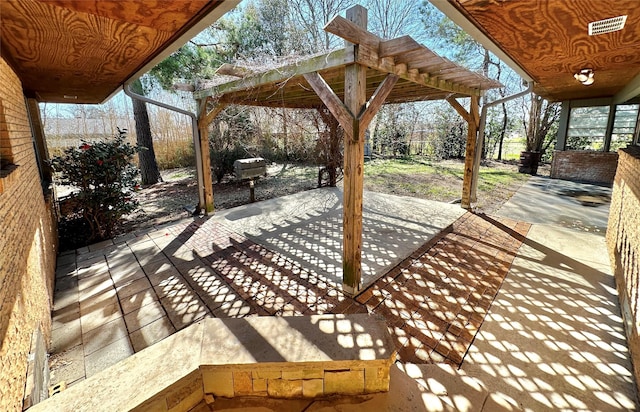 view of patio / terrace featuring a pergola