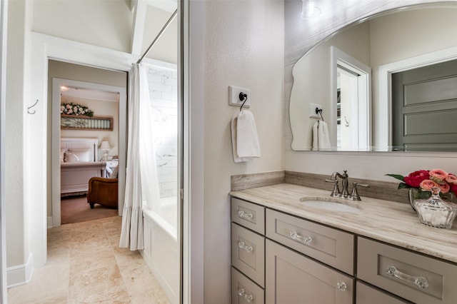 bathroom featuring vanity and shower / bath combo