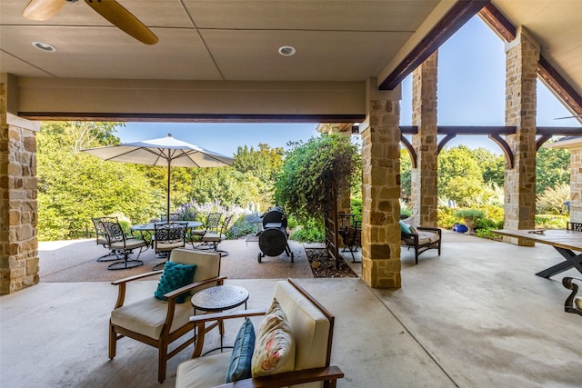 view of patio featuring ceiling fan