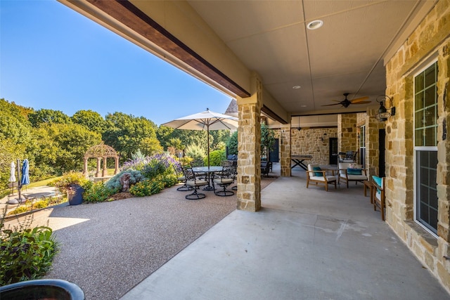 view of patio featuring a gazebo and ceiling fan