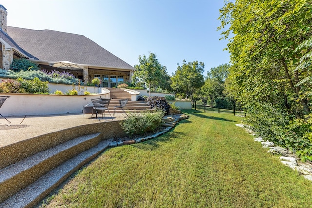 view of yard with a patio area