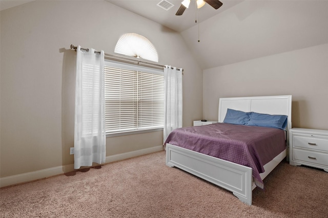 bedroom featuring lofted ceiling, baseboards, carpet floors, ceiling fan, and visible vents