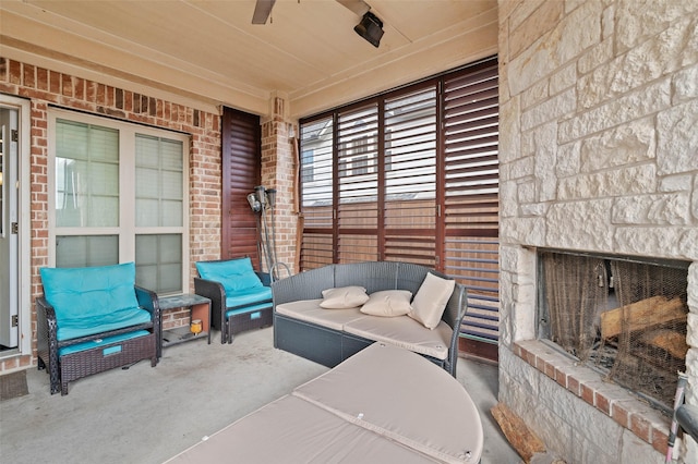 view of patio / terrace featuring ceiling fan