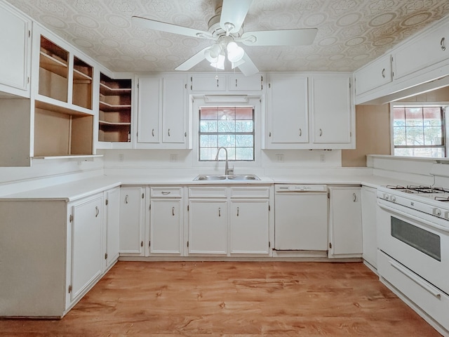 kitchen with white appliances, an ornate ceiling, ceiling fan, and a sink