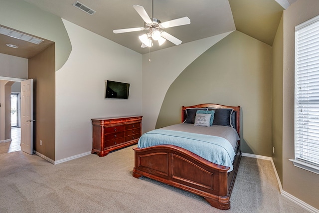 bedroom featuring lofted ceiling, visible vents, light carpet, and baseboards