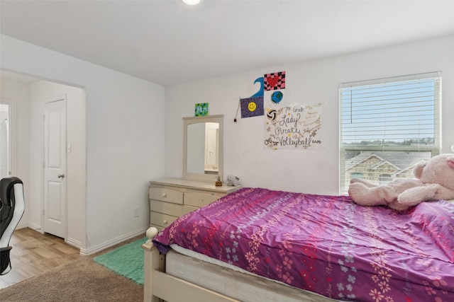 bedroom featuring light hardwood / wood-style floors