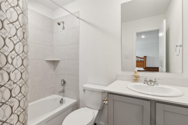 full bathroom featuring toilet, vanity, and shower / bathtub combination with curtain