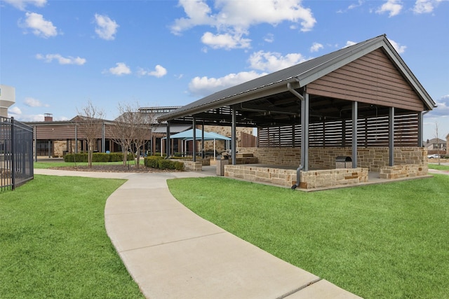 view of home's community with a gazebo and a lawn