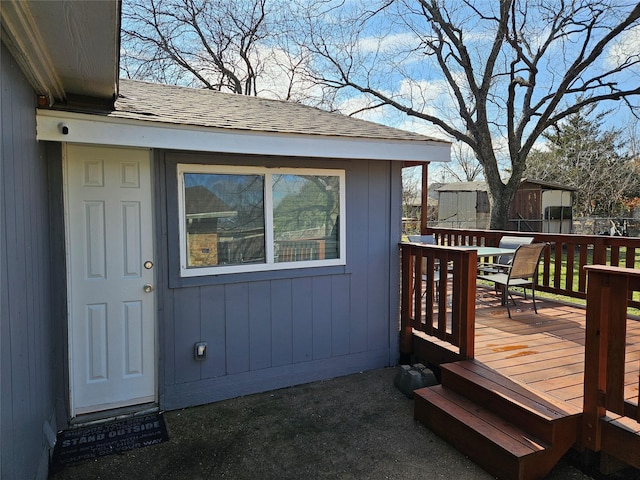 doorway to property with a wooden deck