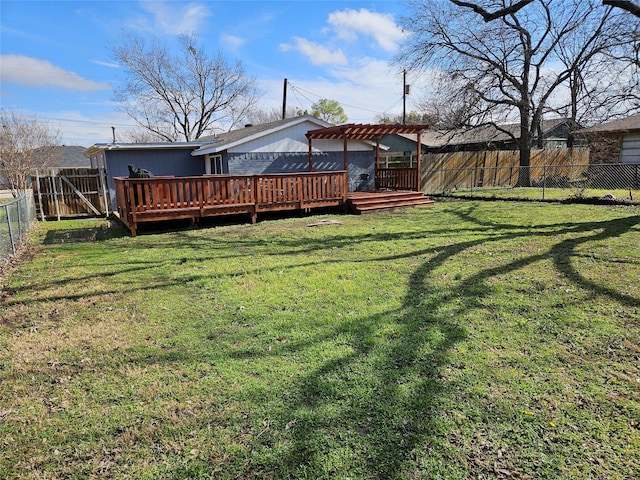 view of yard featuring a pergola and a deck