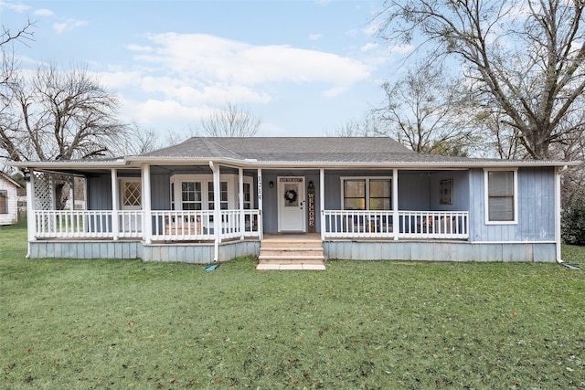 view of front of home featuring covered porch and a front lawn