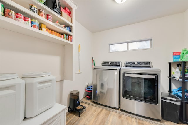 1714 Vz County Road 2142 Unit 2142, Wills Point, TX 75169 - laundry area featuring washing machine and clothes dryer and light wood-style flooring