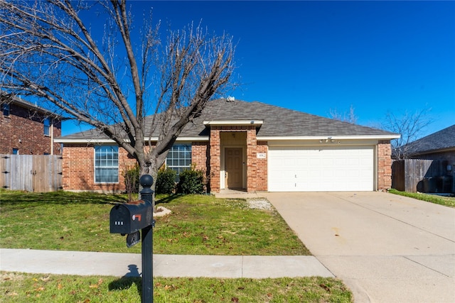 single story home featuring a garage and a front lawn