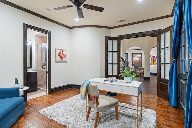 home office featuring ornamental molding, dark wood-type flooring, and ceiling fan