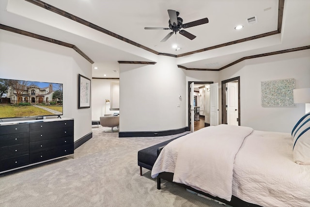 carpeted bedroom with ensuite bathroom, recessed lighting, visible vents, baseboards, and crown molding