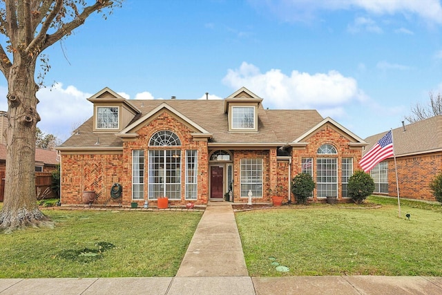 view of front of home with a front yard