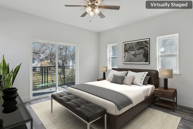 bedroom featuring hardwood / wood-style floors, access to outside, and ceiling fan