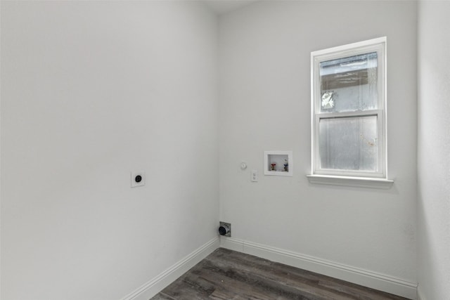 washroom featuring gas dryer hookup, washer hookup, dark wood-type flooring, and hookup for an electric dryer