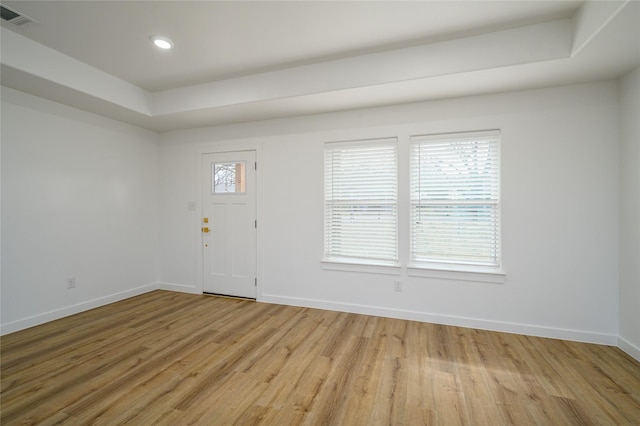 entryway with light hardwood / wood-style floors